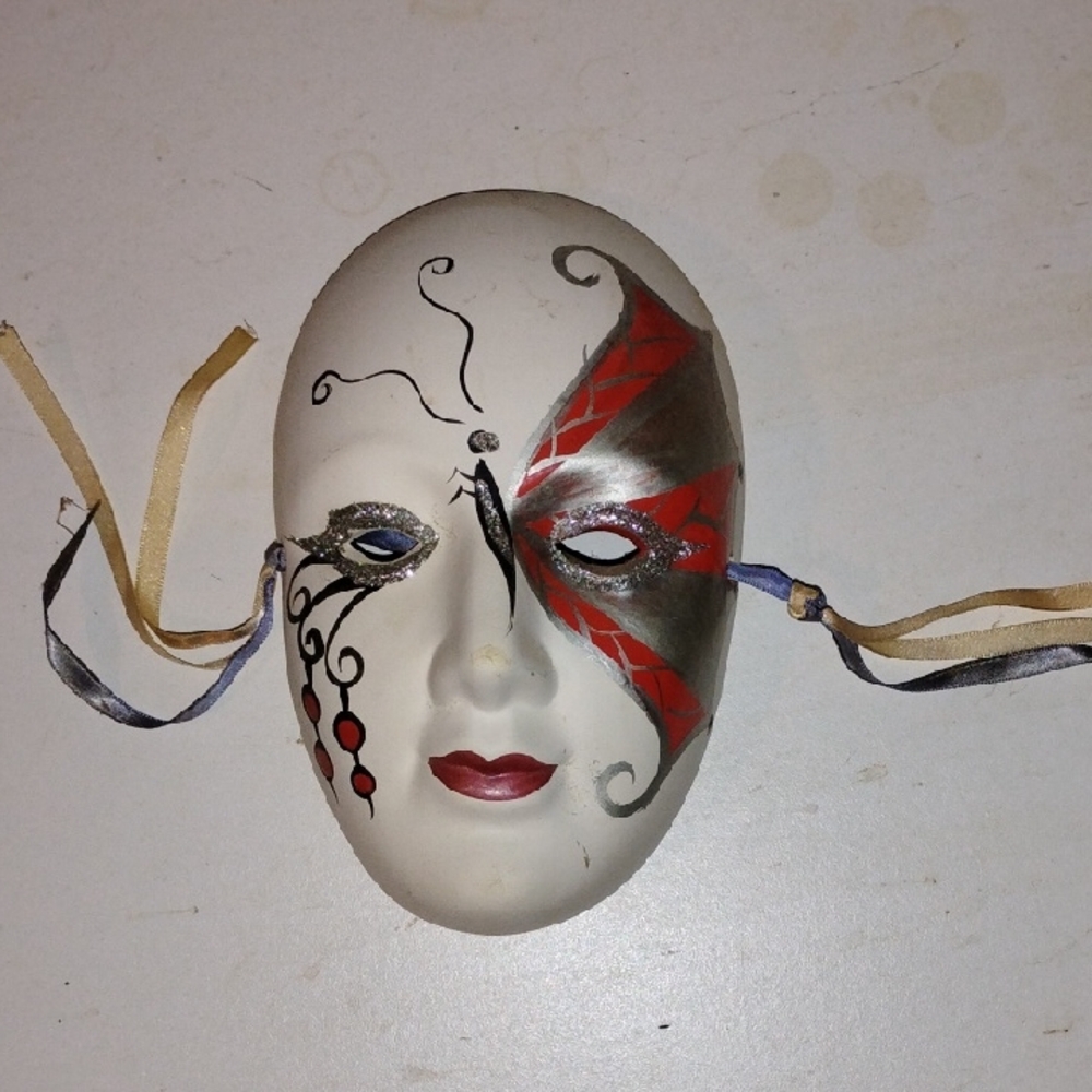 Decorative Mask with Red and Silver Accents